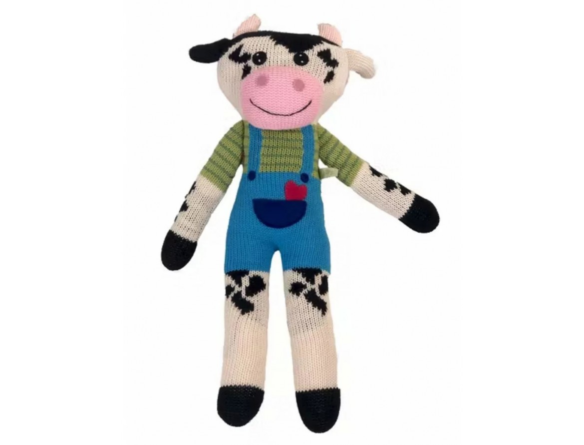 Les peluches vaches noir et blanc authentiques